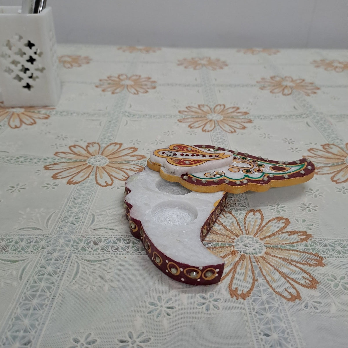 Handcrafted 5 inch white marble tilak chopda in Ganesha trunk shape for pooja kumkum and roli