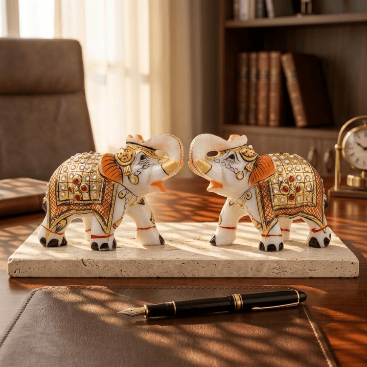 Handcrafted decorative marble elephant artifact with fine carving on Rajasthani Duniyaa.