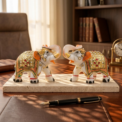 The Royal Ambabari Pair: Hand-Carved Natural White Marble Elephants with Ornate Gold Foil Jhool & Studded Kundan Detailing (Pair of 2)ndcrafted Marble Elephant Pair – Decorative Figurines with Stone & Gold Work