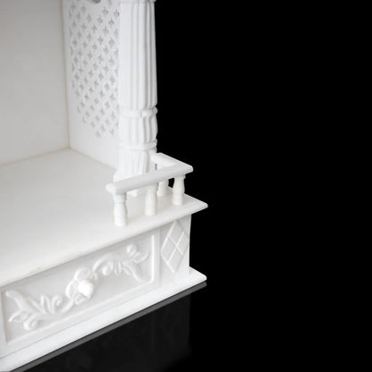 Spacious sanctum area of traditional white marble temple for pooja room