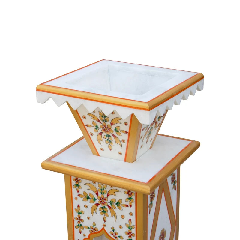 Large traditional painted marble Tulsi pot placed for courtyard and garden decor