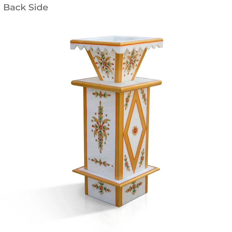 Large traditional painted marble Tulsi pot placed for courtyard and garden decor