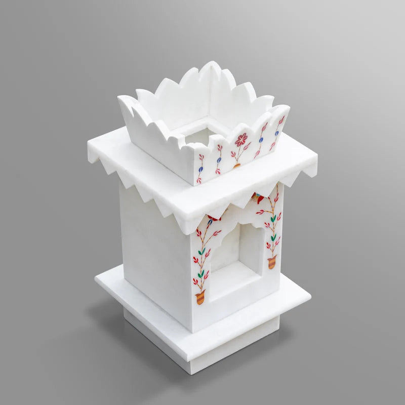Close-up of gemstone inlay work on small white marble Tulsi planter