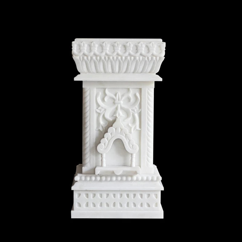 Carved white marble Tulsi pot placed for balcony and courtyard decor