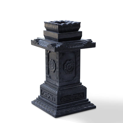 Carved black marble Tulsi pot placed for balcony and courtyard decor