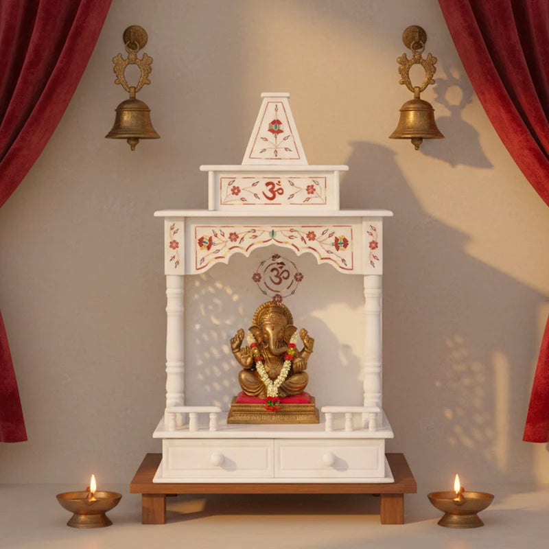 Handcrafted traditional white marble temple featuring vibrant red inlay work