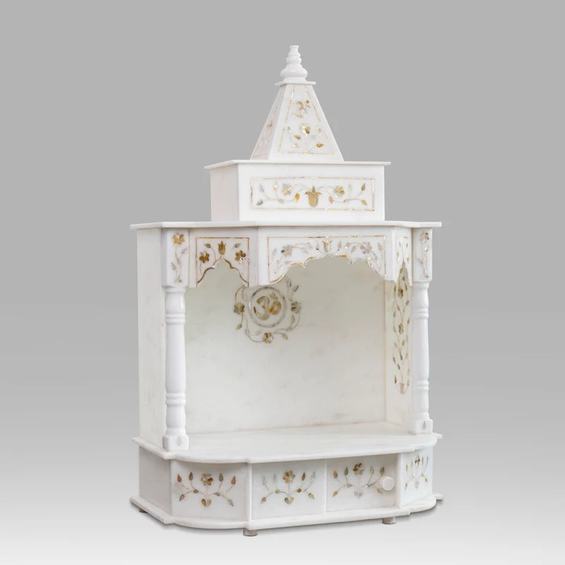 Royal handcrafted marble home temple with golden inlay set up for daily pooja in a modern living space