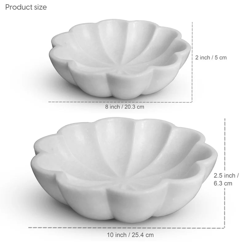 Side profile and depth detail of natural white marble kitchen fruit bowl