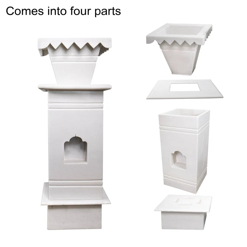 Classic white marble Tulsi pot placed for balcony and garden decor