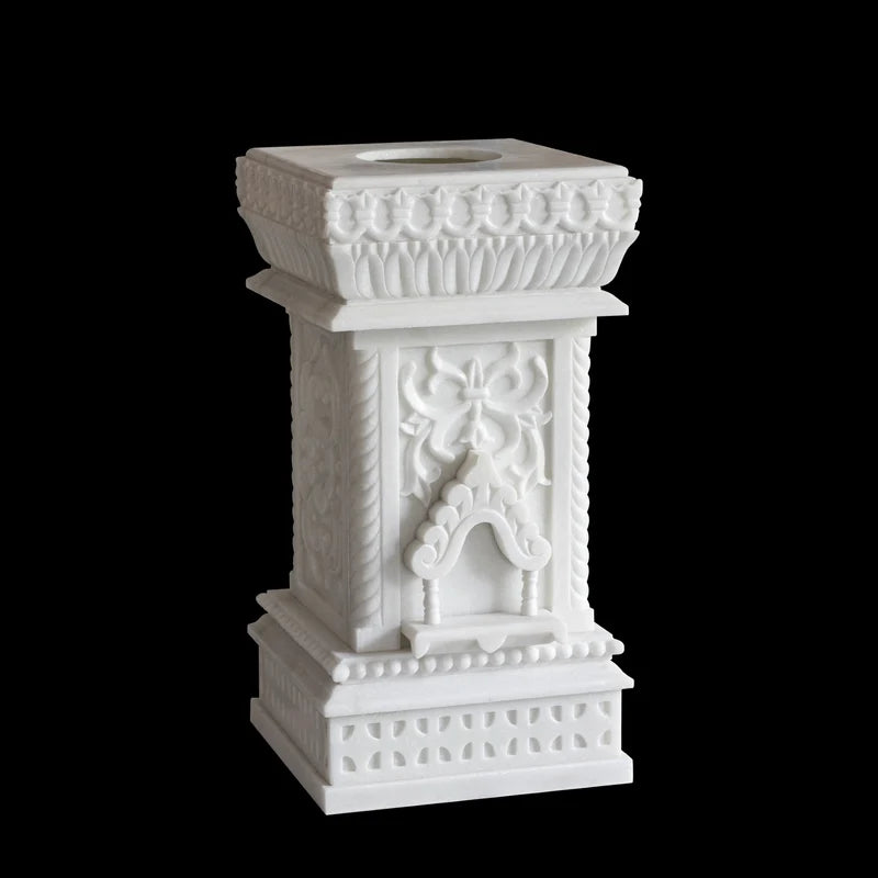Carved white marble Tulsi pot placed for balcony and courtyard decor