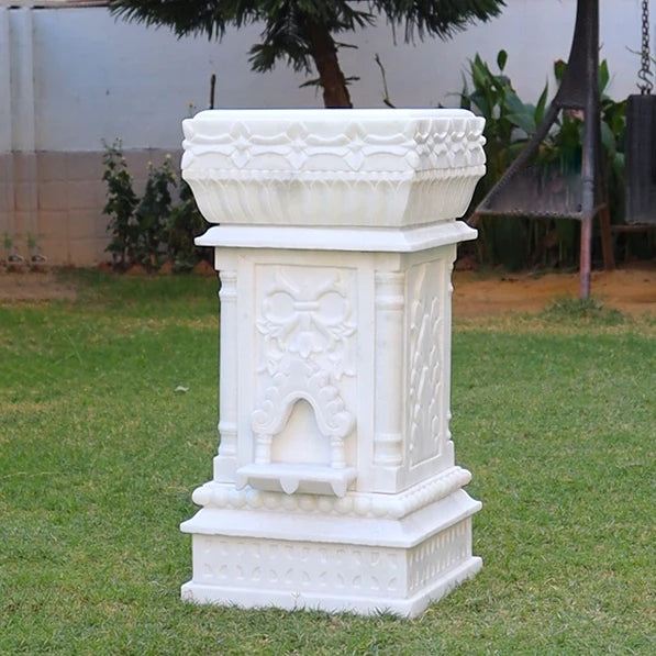 Front view of handcrafted carved white marble Tulsi pot by Rajasthani Duniyaa