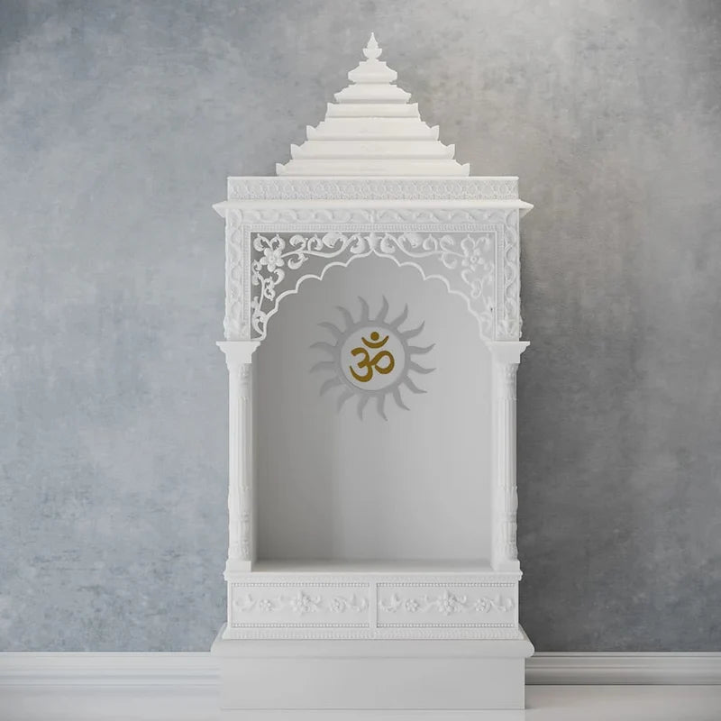 Close-up of Surya carving and pillars on marble pooja mandir