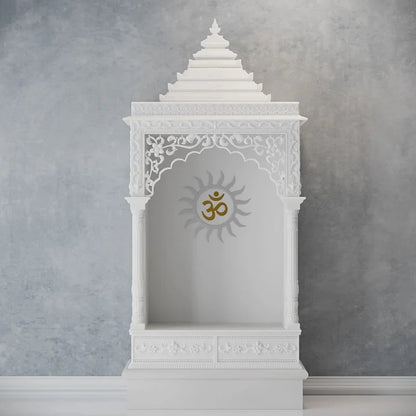 Close-up of Surya carving and pillars on marble pooja mandir