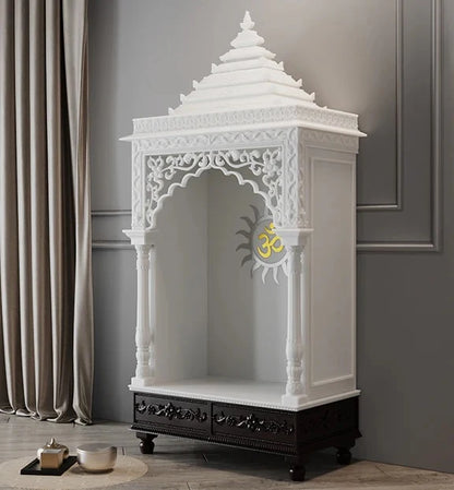 Close-up of Surya carving and pillars on marble pooja mandir