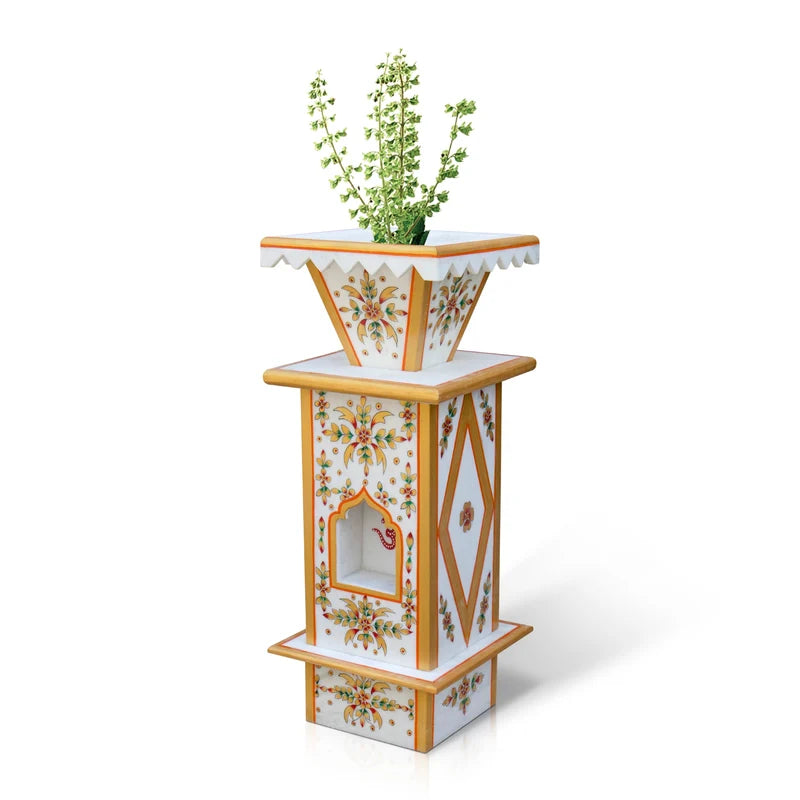 Close-up of traditional hand-painted artwork on large white marble Tulsi pot