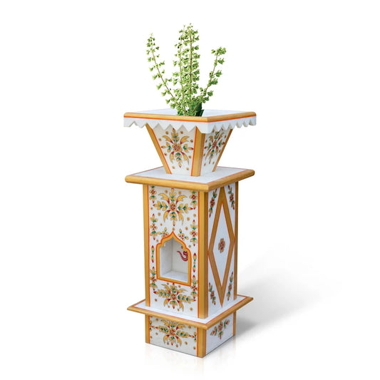 Close-up of traditional hand-painted artwork on large white marble Tulsi pot