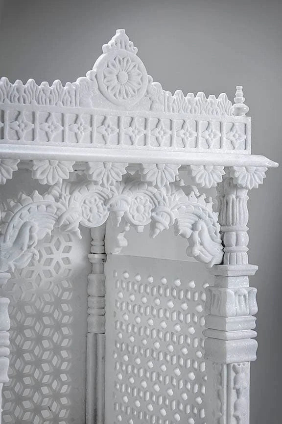 Inner sanctum view of traditional white marble Saral temple for deities