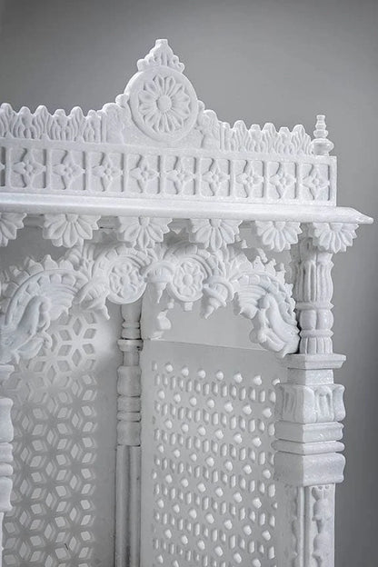 Inner sanctum view of traditional white marble Saral temple for deities