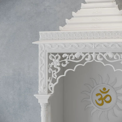 Inner sanctum view of traditional white marble temple with Surya design