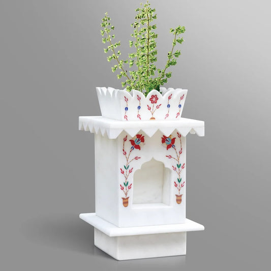 Close-up of gemstone inlay work on small white marble Tulsi planter