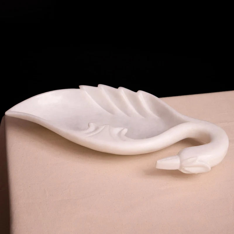 Front view of handcrafted peacock motif white marble Urli bowl by Rajasthani Duniyaa