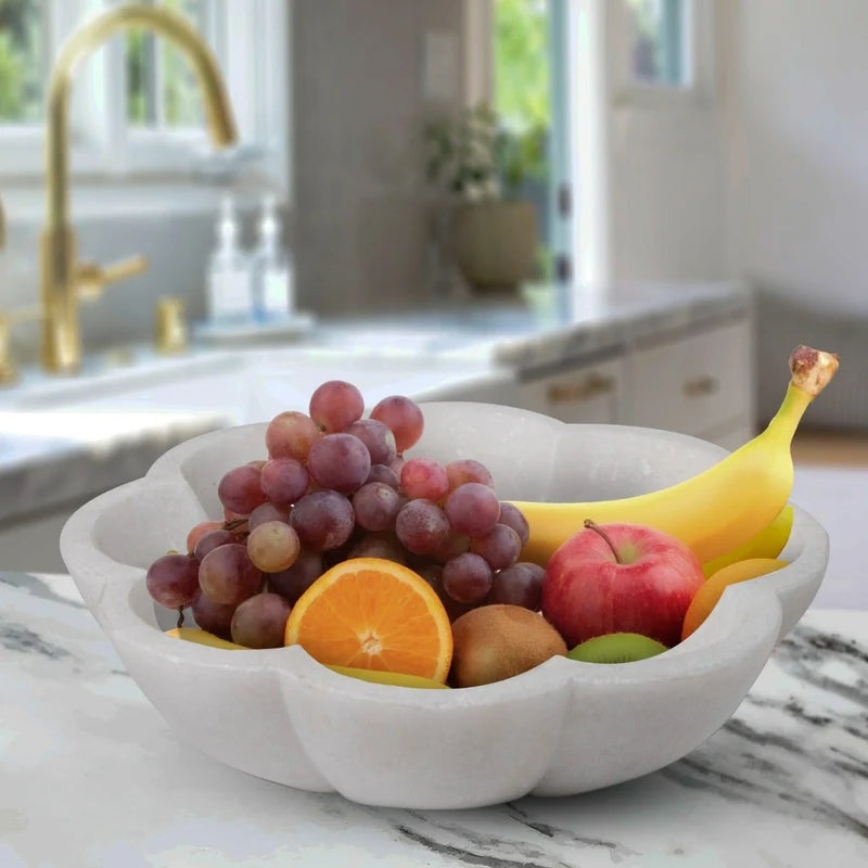 Side profile and depth detail of natural white marble kitchen fruit bowl