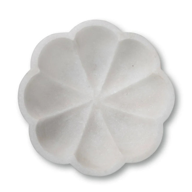 Side profile and depth detail of natural white marble kitchen fruit bowl