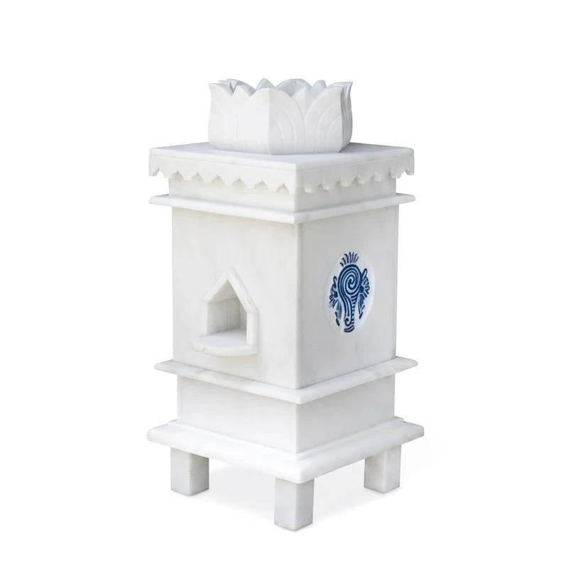 White marble Tulsi pot with 3 symbols placed for balcony and courtyard decor