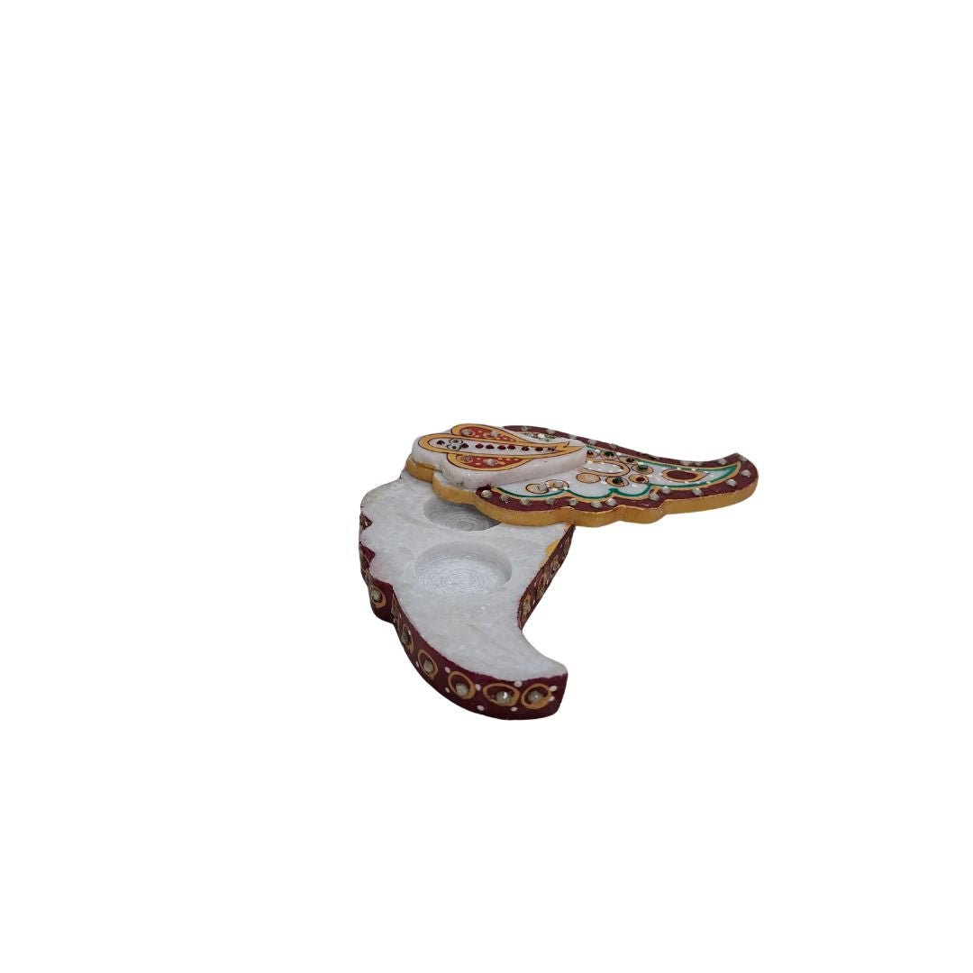 Handcrafted 5 inch white marble tilak chopda in Ganesha trunk shape for pooja kumkum and roli