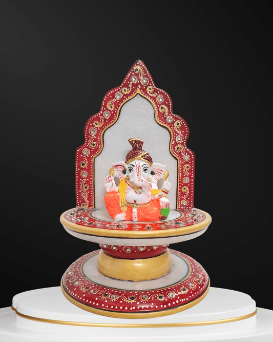 Handcrafted 7-inch marble singhasan with premium resin Ganesh idol decorative pooja set