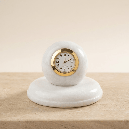Intricate heritage gold enamel artwork on a detachable spherical marble desk clock