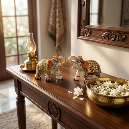 The Royal Ambabari Pair: Hand-Carved Natural White Marble Elephants with Ornate Gold Foil Jhool & Studded Kundan Detailing (Pair of 2)ndcrafted Marble Elephant Pair – Decorative Figurines with Stone & Gold Work
