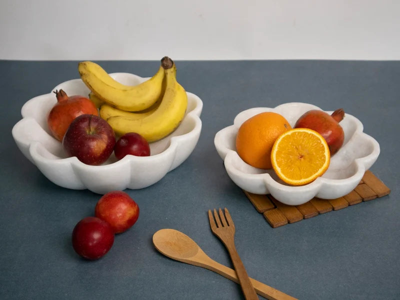 Side profile and depth detail of natural white marble kitchen fruit bowl