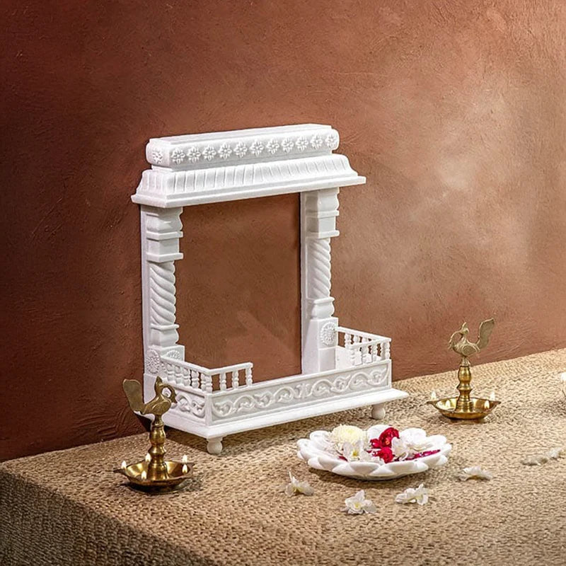 Side pillars and architectural detail of white marble Anu pooja mandir